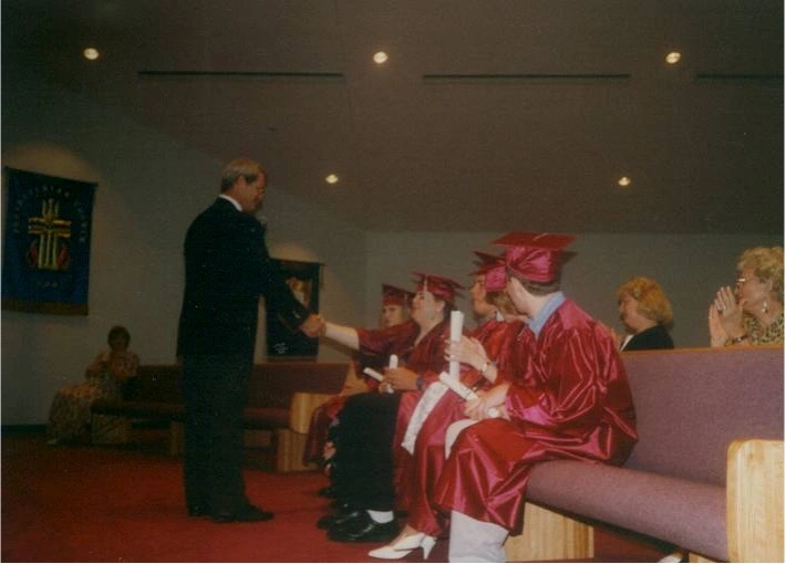 Bob Flanders with graduates in 1998