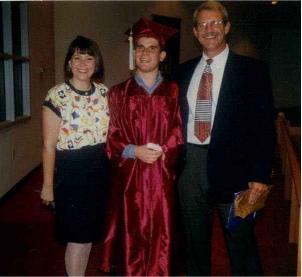 Bob and Rowena with a graduate