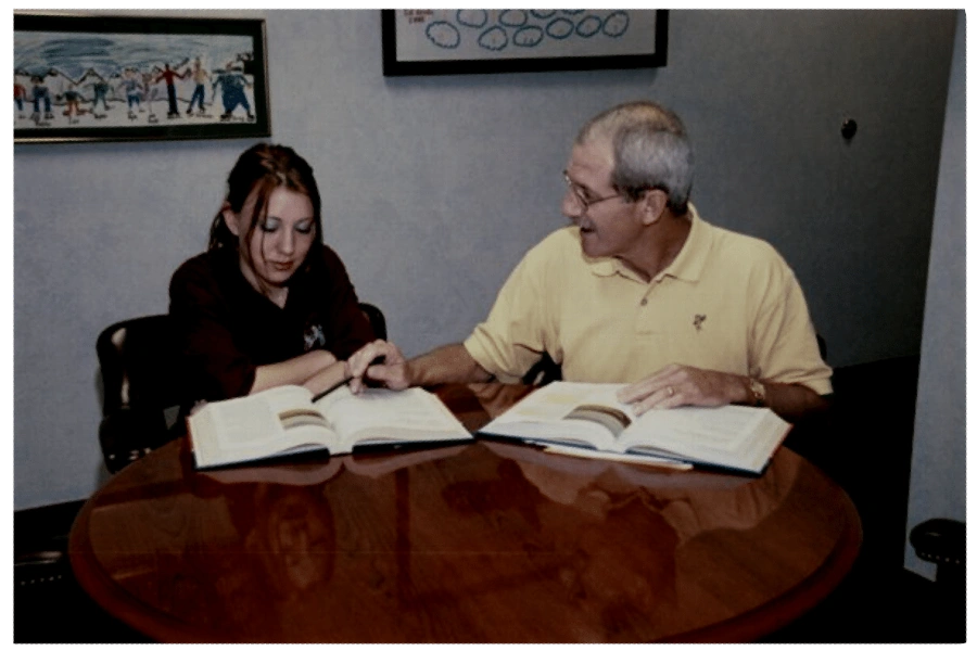 Bob Flanders working with a student